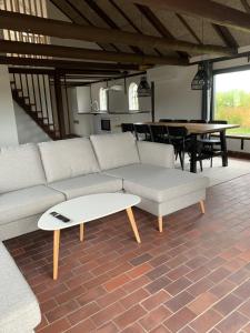 Posezení v ubytování Gl. Klitgaard Camping & Cottages