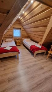 Postel nebo postele na pokoji v ubytování Pokoje u Celinki