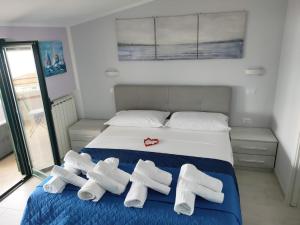 Postel nebo postele na pokoji v ubytování Sognando Agropoli