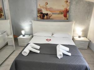 Postel nebo postele na pokoji v ubytování Sognando Agropoli