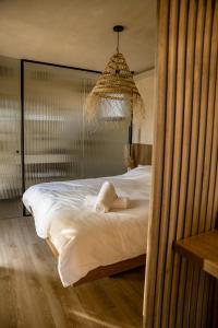 Tempat tidur dalam kamar di Dawar Canaan Paradise - Luxury Haven