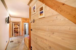 a large wooden wall in a house at Maison Grange 4 in Gressan