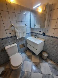 A bathroom at You&me room