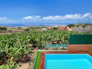 Bazén v ubytovaní La Casa de Arriba Arucas by VillaGranCanaria alebo v jeho blízkosti