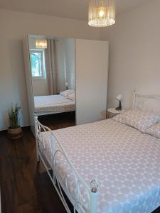 Posteľ alebo postele v izbe v ubytovaní Apartman Mandi + 8 fotografií