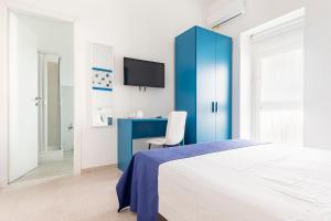 Cama o camas de una habitación en Dimora Terra di Puglia