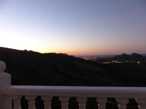 a view of the sunset from the balcony of a house at Casa Lobo in Pedreguer