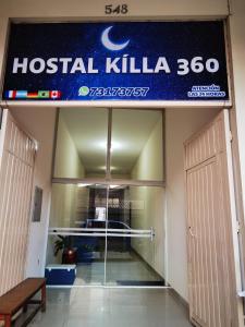 a hospital lobby with a hospital killka sign above a door at Hostal Killa360 Luna in Santa Cruz de la Sierra
