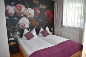 Una cama o camas en una habitación de Hotel Kleißl
