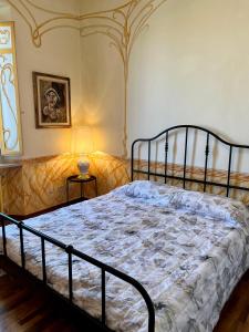 Tempat tidur dalam kamar di Residenza del Duca