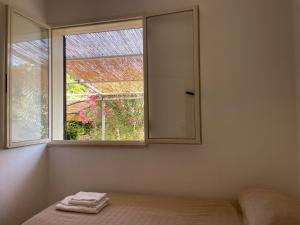 Ένα ή περισσότερα κρεβάτια σε δωμάτιο στο Holiday Home Salento
