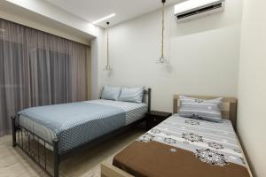 Ένα ή περισσότερα κρεβάτια σε δωμάτιο στο Vila SHAKAJ