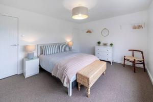 מיטה או מיטות בחדר ב-Shore House - Walton
