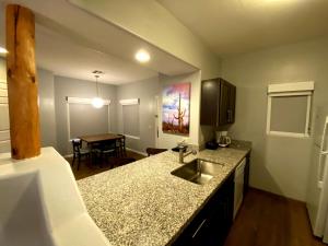 a kitchen with a sink and a counter top at WorldMark Rancho Vistoso in Oro Valley
