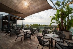 Reštaurácia alebo iné gastronomické zariadenie v ubytovaní MenDan Magic Spa & Wellness Hotel