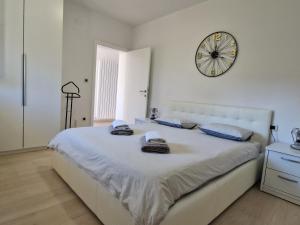 Ένα ή περισσότερα κρεβάτια σε δωμάτιο στο Apartmani Melanie +43 φωτογραφίες