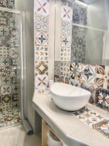Koupelna v ubytování D'Angiò Rooms-Manfredi Homes&Villas