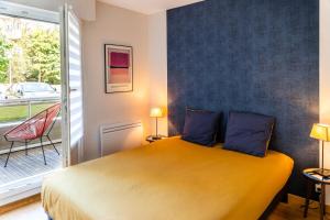 Postel nebo postele na pokoji v ubytování SUNSHINE - Appartement 2pers - terrasse vue mer - Dinard