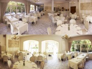 a dining room with white tables and chairs at Hotel La Pigna in Marina di Pietrasanta