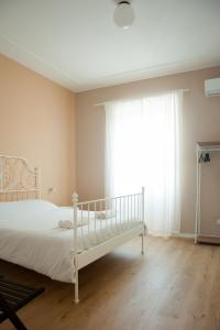 Postel nebo postele na pokoji v ubytování Three Rooms Alghero