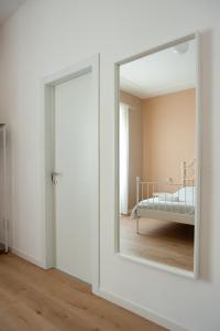 Rúm í herbergi á Three Rooms Alghero