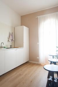 Eldhús eða eldhúskrókur á Three Rooms Alghero
