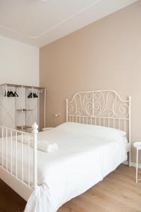 Rúm í herbergi á Three Rooms Alghero
