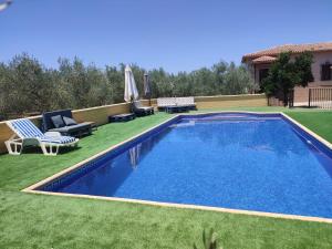 The swimming pool at or close to LOS ABUELOS