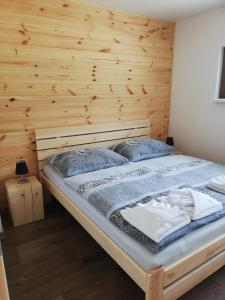 Postel nebo postele na pokoji v ubytování Wellness Hotel Koliba
