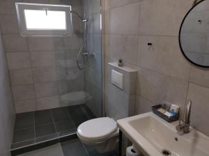 Koupelna v ubytování Wellness Hotel Koliba