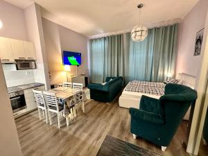 Η κουζίνα ή μικρή κουζίνα στο Kings main square Apartment