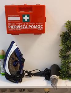 a helmet sitting on top of a shelf at Prywatny pokój dla dwóch osób. Centrum. Pokój 5 in Warsaw