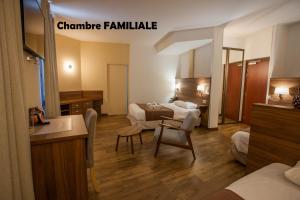 Hôtel Terminus - Pizzeria Pizz'a gogo - salle de sport - face à la gare客房内的一张或多张床位