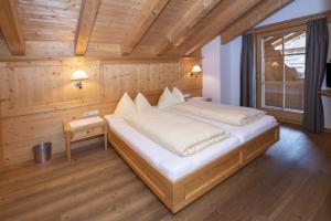 Łóżko lub łóżka w pokoju w obiekcie Gästehaus Larch