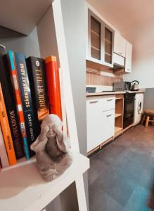 A kitchen or kitchenette at K22 Apartman