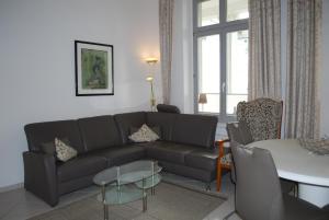 Ein Sitzbereich in der Unterkunft Villa Schering App. EG links