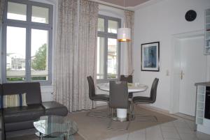 Ein Sitzbereich in der Unterkunft Villa Schering App. EG links