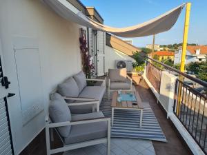 En balkon eller terrasse på Rosso di Sera