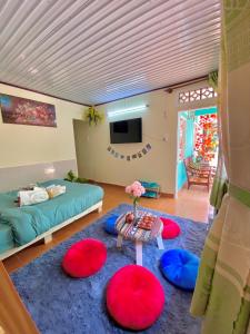 a living room with a couch and a table at Rose's House in Khu Chi Lăng