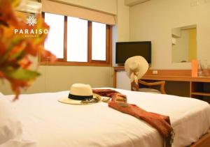 Postel nebo postele na pokoji v ubytování Hoteles Paraiso TRUJILLO
