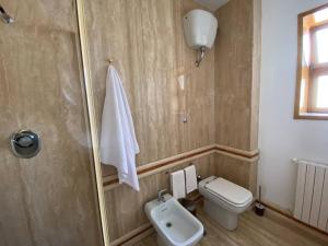 a bathroom with a shower and a toilet and a sink at Only in Bari in Bari +6 photos