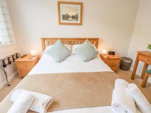 Ένα ή περισσότερα κρεβάτια σε δωμάτιο στο Swirl How