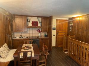 Η κουζίνα ή μικρή κουζίνα στο Cozy Apartment Ruitor +11 φωτογραφίες