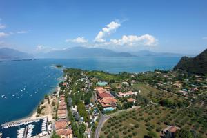 an aerial view of a town next to the water at Residence Miralago Rooms & Apartments in Manerba del Garda