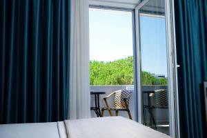 Balkón nebo terasa v ubytování Atrium Deluxe Resort