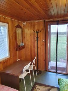 Φωτογραφία από το άλμπουμ του Stovyklavietė „Varlium pastauninks“ σε Kumžaičiai