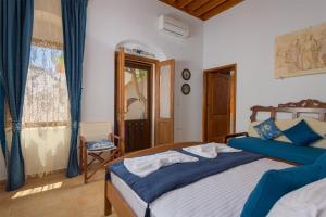 Postel nebo postele na pokoji v ubytování Villa Kleovoulini in Lindos