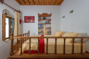 Postel nebo postele na pokoji v ubytování Villa Kleovoulini in Lindos
