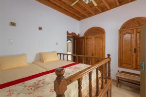 Postel nebo postele na pokoji v ubytování Villa Kleovoulini in Lindos