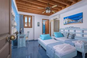 Postel nebo postele na pokoji v ubytování Villa Kleovoulini in Lindos